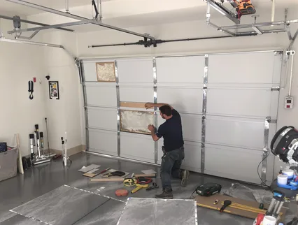 Garage Door Panel Repair in Boynton Beach