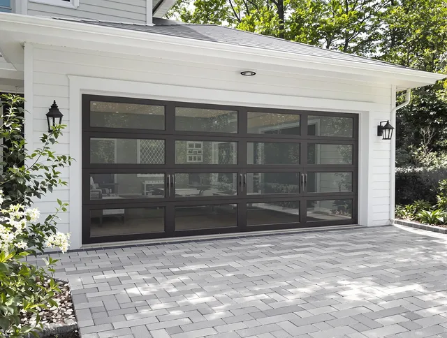 Boynton Beach Garage Door Repair design specialist presenting custom garage door options to Boynton Beach homeowner