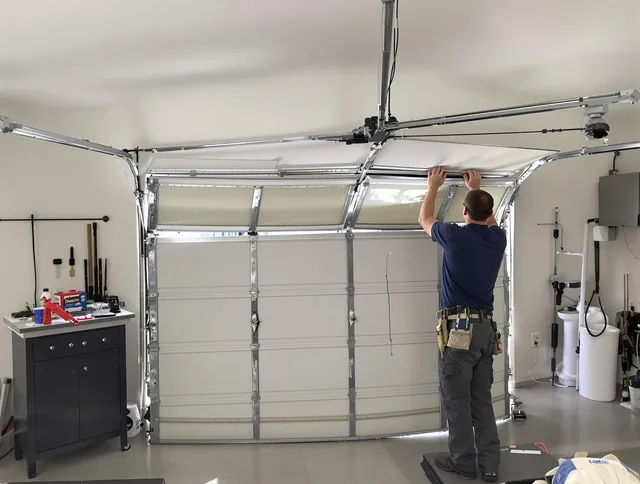 Boynton Beach Garage Door Repair specialist performing precise section replacement on Boynton Beach garage door