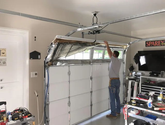 Garage door section replacement by Boynton Beach Garage Door Repair in Boynton Beach