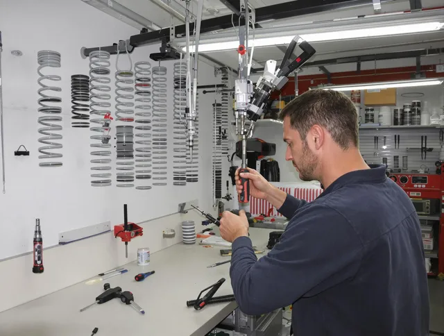 Boynton Beach Garage Door Repair safety certified technician performing precision spring replacement in Boynton Beach