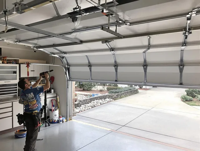 Garage door track repair service by Boynton Beach Garage Door Repair in Boynton Beach